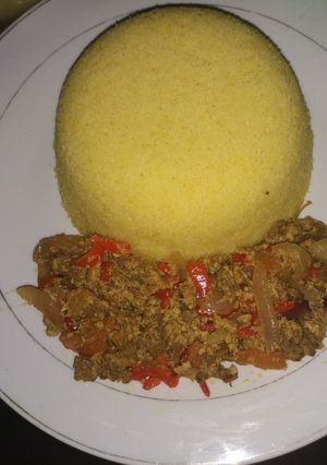 A picture of Curry Cuscous with minced meat and egg sauce.