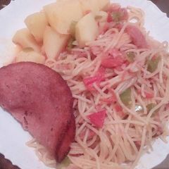 A picture of Spaghetti, potatoes and beef.