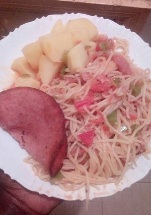 A picture of Spaghetti, potatoes and beef.