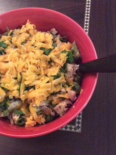 A picture of Chicken, broccoli, cheese & rice.