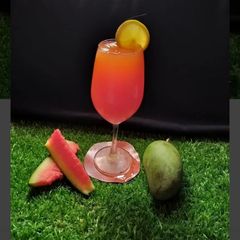 A picture of Mango sunset mocktail.