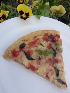 Una foto de Pizza margherita (pizza Margarita)