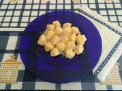 Una foto di gnocchi al gorgonzola
