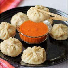 Momos (Chicken filling) A picture of Momos (Chicken filling).
