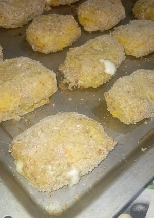 Una foto de Bastones de polenta y queso