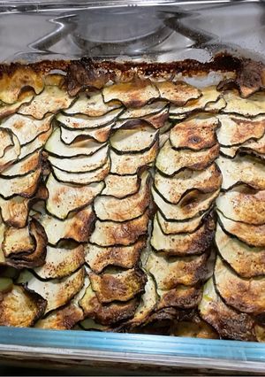 Une photo de Gratin de courgettes et pommes de terre au lomo et roquefort