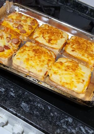 Una foto de Paninis de pan de molde