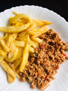 A picture of Chips with egg sauce.