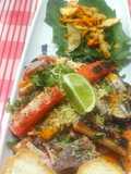 Tallarines en tinta de calamar con Mariscos en crema marinera