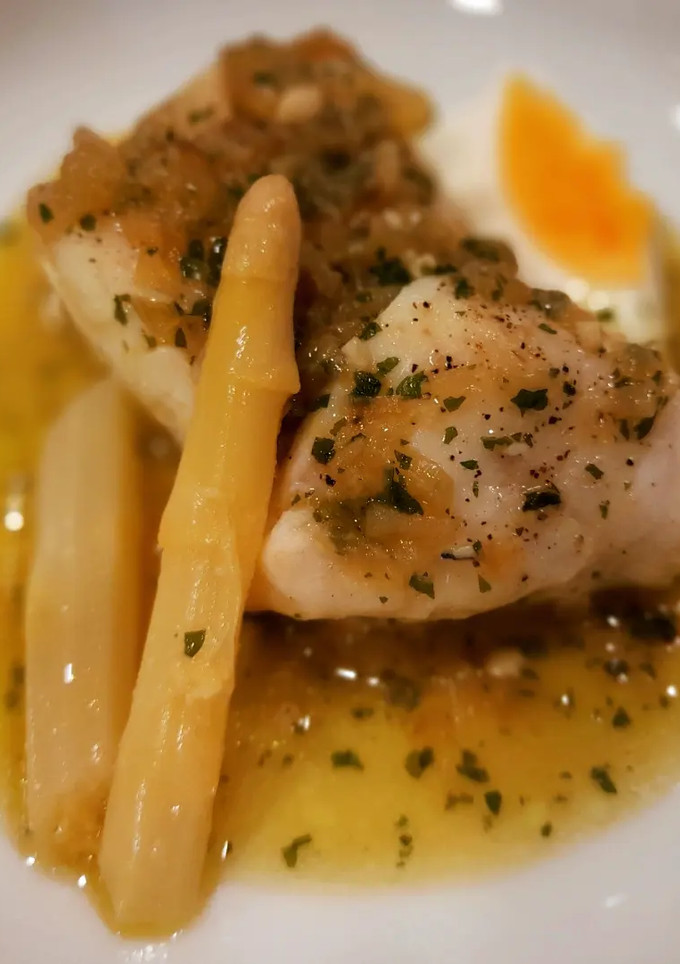 Una foto de Merluza en salsa verde