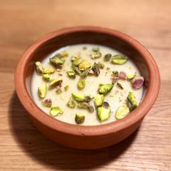 A picture of Mouhalabiyeh - Middle eastern milk pudding with cardamom and saffron (can be vegan).
