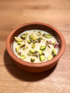 A picture of Mouhalabiyeh - Middle eastern milk pudding with cardamom and saffron (can be vegan).