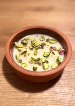 A picture of Mouhalabiyeh - Middle eastern milk pudding with cardamom and saffron (can be vegan).