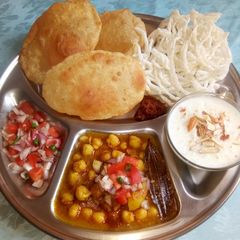 A picture of North Indian breakfast thali.