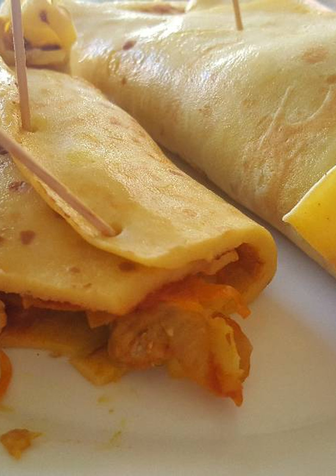 Una foto de "Burritos" de carne y verduras