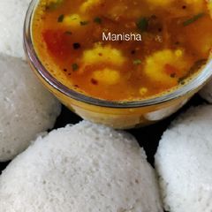 A picture of Soft Idli with Babycorn Sambar.