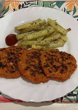 Una foto de Hamburguesas de pollo, calabaza y zanahoria