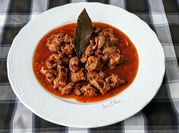 Una foto de mollejas de pollo en salsa