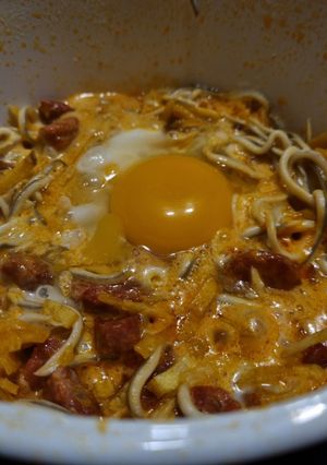 A picture of Skillet Broken Eggs with Imitation Baby Eel and Chorizo.