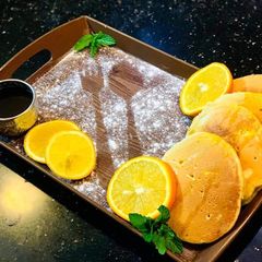 A picture of Orange pancakes.