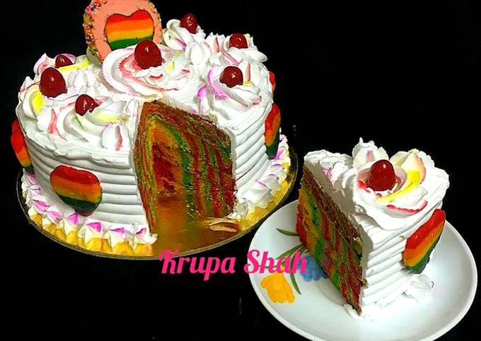 Rainbow marble cake with frosting (eggless)