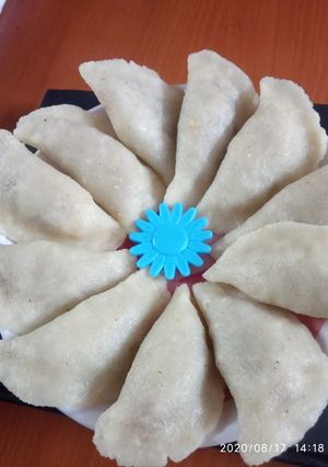 A picture of Pitha (Bengali Coconut-Stuffed Pitha).