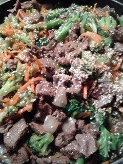 A picture of Sesame beef and broccoli.
