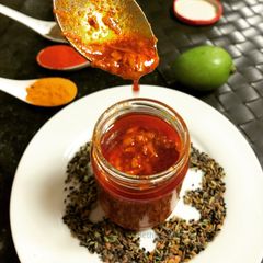 A picture of Raw Mango Pickle with Panch Phoron Flavour.