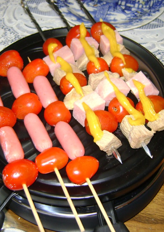 Una foto de Parrilla racletera para compartir con amigos