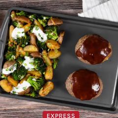 A picture of HC- Sheet Pan Cheddar-Jack BBQ Meatloaf with roasted loaded potatoes and broccoli.