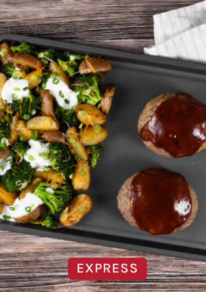 A picture of HC- Sheet Pan Cheddar-Jack BBQ Meatloaf with roasted loaded potatoes and broccoli.