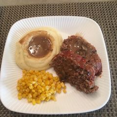 A picture of Meatloaf with Mushroom gravy.