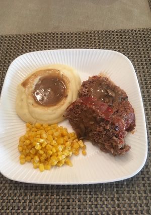 A picture of Meatloaf with Mushroom gravy.
