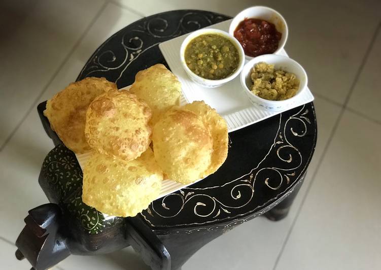 Recipe of MahaAshtami Sandhi Puja Thali: Luchi, Chholar Daal, Tomato Chutney &amp; Kesari Halwa in 10 Minutes at Home