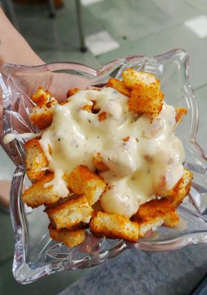 A picture of Cheesy Chilli Garlic Bread Popcorn.
