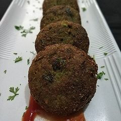 A picture of Spinach -Rice Tikki.