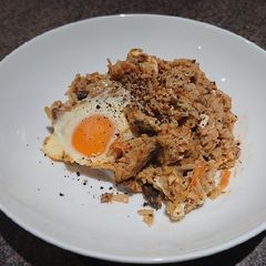 A picture of Tuna Rice With Runny Eggs.