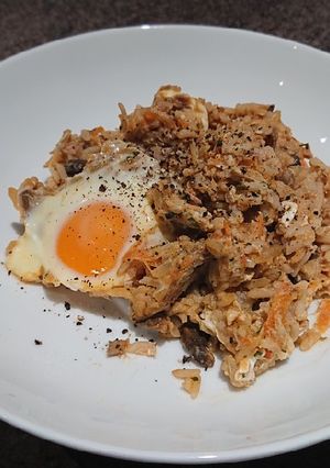 A picture of Tuna Rice With Runny Eggs.
