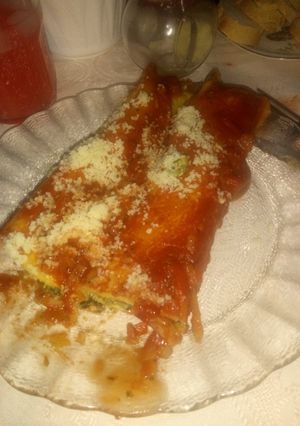 Una foto de Canelones de ricota y espinaca con masa de zanahoria