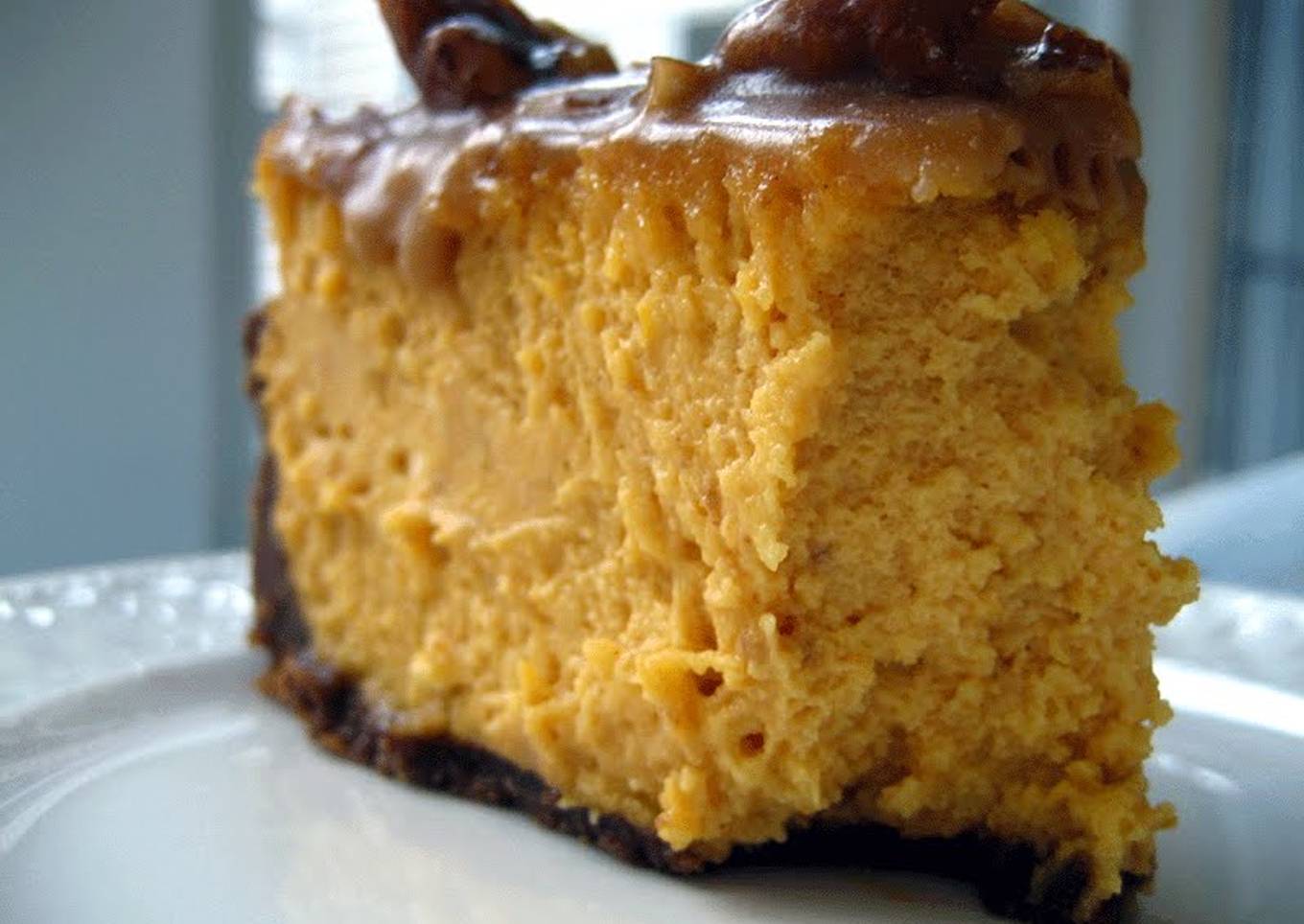 Pumpkin Cheesecake with Gingersnap crust & Praline Caramel topping