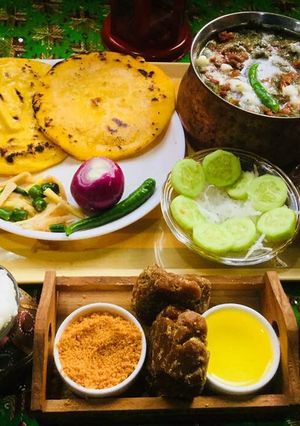 A picture of Sarso Ka saag with makki ki Roti.