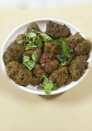 A picture of Bajri methi muthia/ pearlmilet fenugreek muthia.