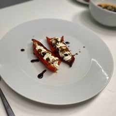 A picture of Goat cheese cream stuffed peppers.