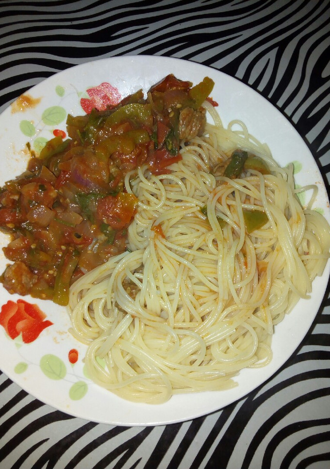 A picture of Spaghetti with beef stew.