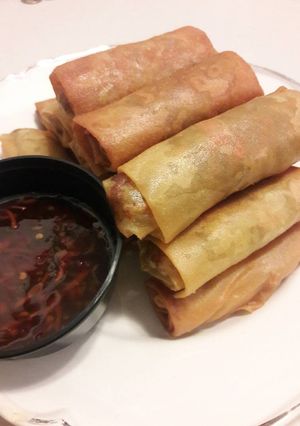 A picture of Curry chicken spring rolls.
