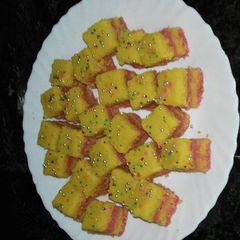 A picture of Nariyal leyard Cake.