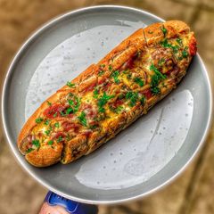 A picture of Garlic bread meatball sub.