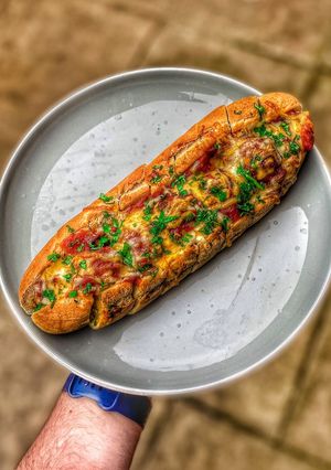 A picture of Garlic bread meatball sub.