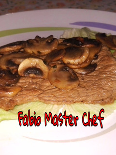 Foto di Fettine di Vitello con Funghi Champignon e Salsa di Soia