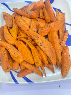 A picture of Roasted spiced orange sweet potatoes 🍠.